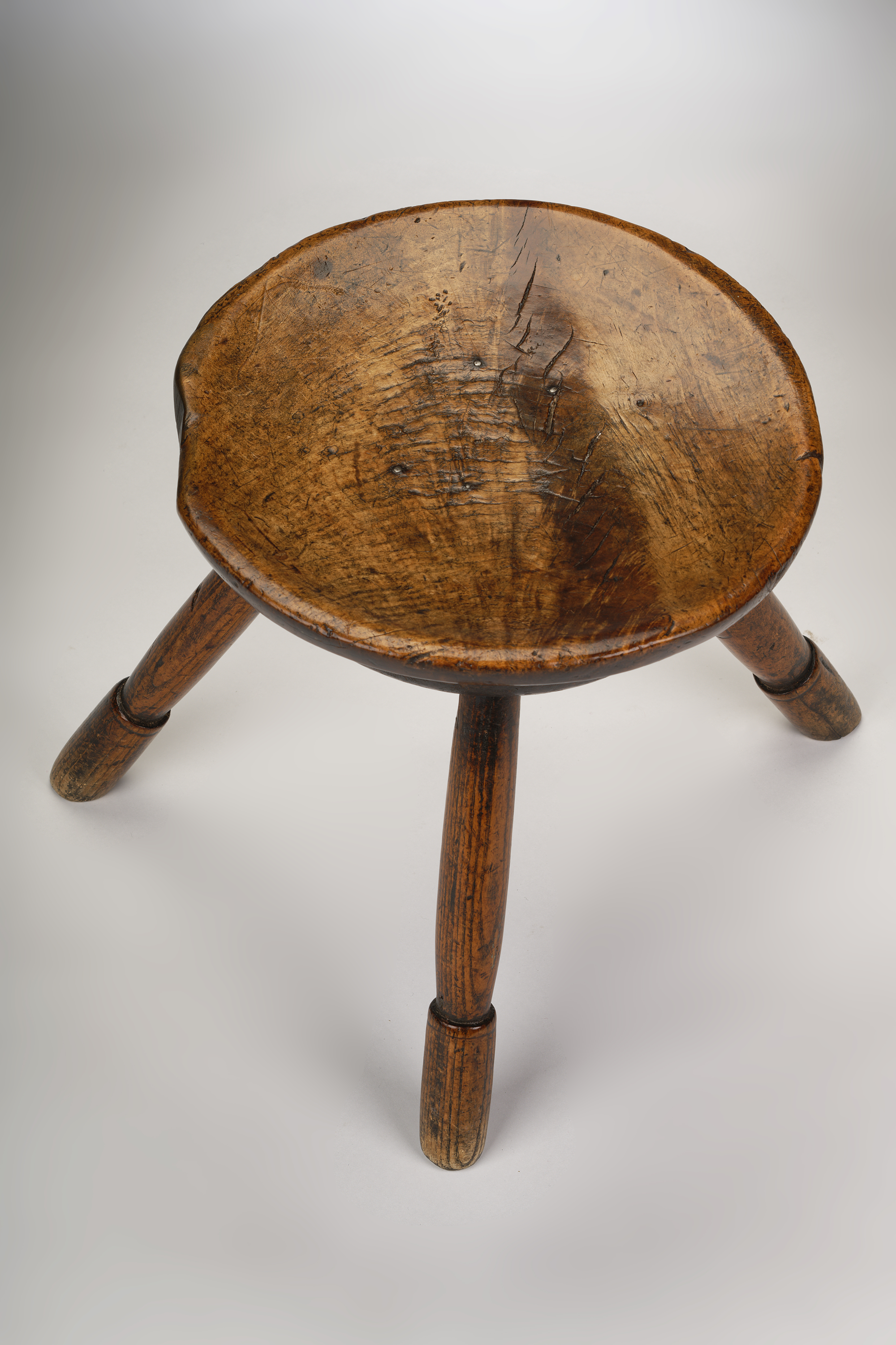 Image of A Turned Sycamore & Ash Dairy Stool.